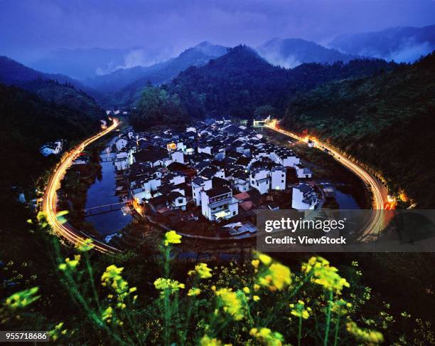 jujing village of wuyuan county,jiangxi province,china - erblühen zeitraffer stock-fotos und bilder