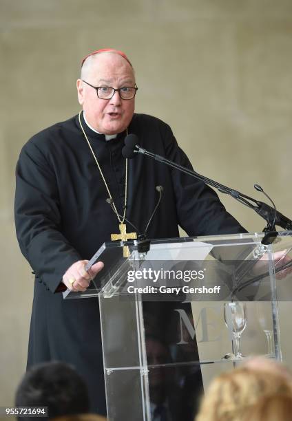 Archbishop of New York Cardinal Timothy Michael Dolan speaks during 'Heavenly Bodies: Fashion & The Catholic Imagination' Costume Institute Gala...