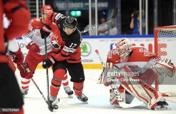 Jaden Schwartz of Team Canada and Sebastian Dahm of Team Denmark during the IIHF World Championship game between Canada and Denmark at Jyske Bank...