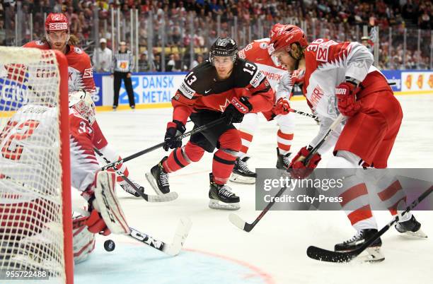 Matt Barzal of Team Canada and Philip Larsen of Team Denmark during the IIHF World Championship game between Canada and Denmark at Jyske Bank Boxen...