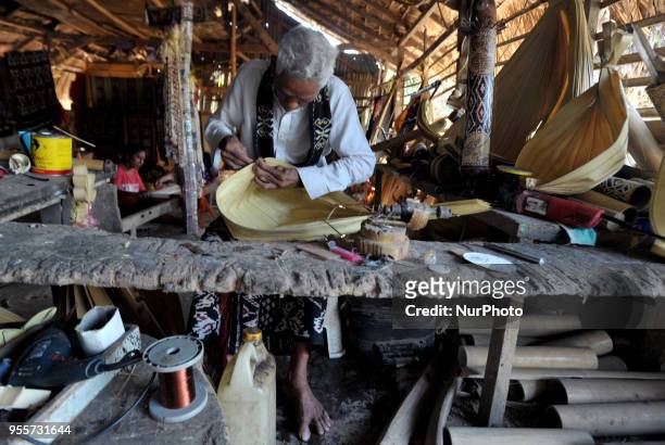 Yeremias Ougust Pah, 78-year-old Sasando traditional instrument maker at the sasando-making workshop in Oebelo village of East Nusa Tenggara,...