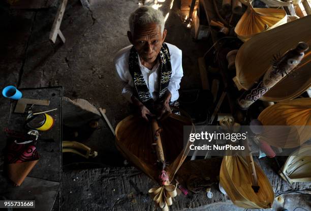 Yeremias Ougust Pah, 78-year-old Sasando traditional instrument maker at the sasando-making workshop in Oebelo village of East Nusa Tenggara,...