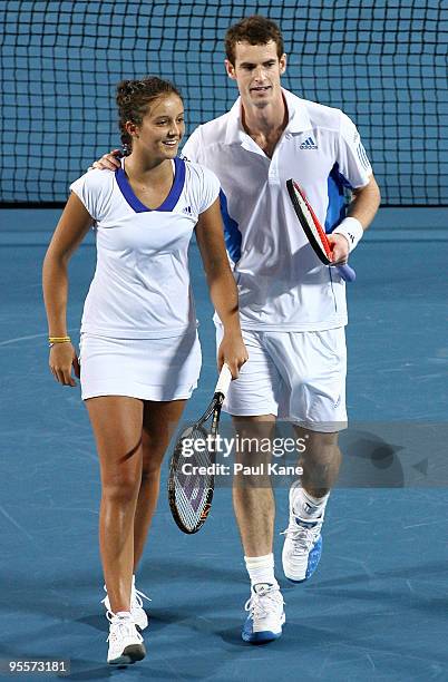 Laura Robson and Andy Murray of Great Britain celebrate winning a tie break point in their mixed doubles game against Yaroslava Shvedova and Andrey...