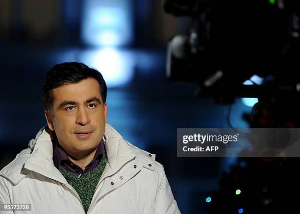 Georgian President Mikheil Saakashvili speaks during the filming of his New Year address to the nation in Batumi on December 31, 2009. AFP...