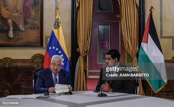 Palestinian President Mahmud Abbas and his Venezuelan counterpart Nicolas Maduro hold a meeting at the Miraflores presidential palace in Caracas on...