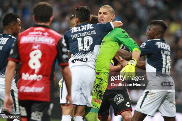 Jonathan Urretaviscaya of Monterrey and Manuel Lajud reacts during the quarter finals second leg match between Monterrey and Tijuana as part of the...
