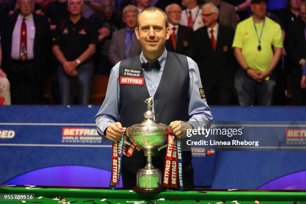 Mark Williams of Wales pose for a picture with his trophy after winning the tournament during day seventeen of World Snooker Championship at Crucible...