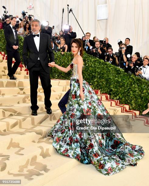 George Clooney and Amal Clooney attend the Heavenly Bodies: Fashion & The Catholic Imagination Costume Institute Gala at The Metropolitan Museum of...