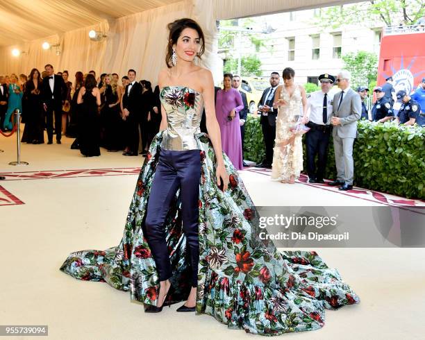 Amal Clooney attends the Heavenly Bodies: Fashion & The Catholic Imagination Costume Institute Gala at The Metropolitan Museum of Art on May 7, 2018...