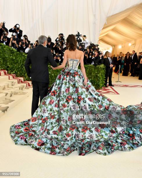 George Clooney and Met Gala Host Amal Clooney attend 2018 Met Gala Host Amal Clooney attend the Heavenly Bodies: Fashion & The Catholic Imagination...