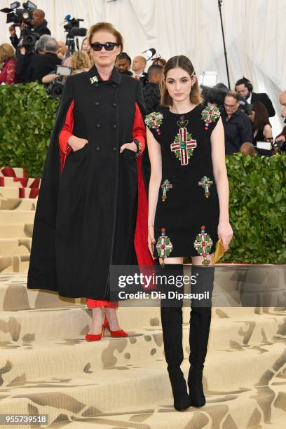 Lisa Love and Laura Love attend the Heavenly Bodies: Fashion & The Catholic Imagination Costume Institute Gala at The Metropolitan Museum of Art on...