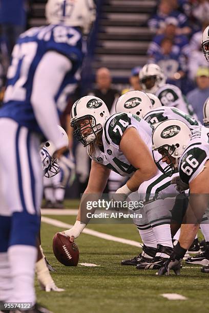 Center Nick Mangold of the New York Jets calls a play against the Indianapolis Colts at Lucas Oil Stadium on December 27, 2009 in Indianapolis,...