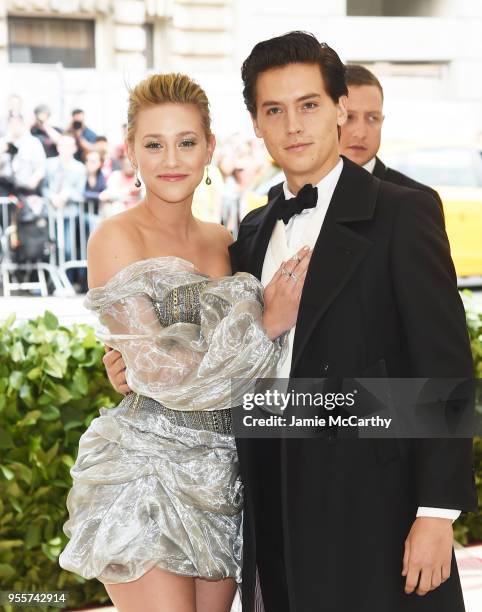 Lili Reinhart and Cole Sprouse attend the Heavenly Bodies: Fashion & The Catholic Imagination Costume Institute Gala at The Metropolitan Museum of...