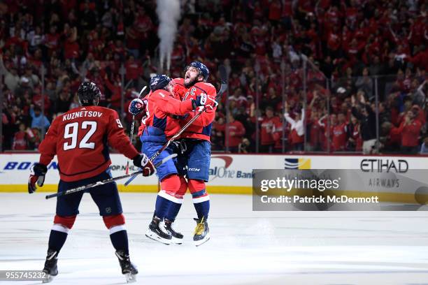 Jakub Vrana of the Washington Capitals celebrates with Alex Ovechkin after scoring a third period goal against the Pittsburgh Penguins in Game Five...