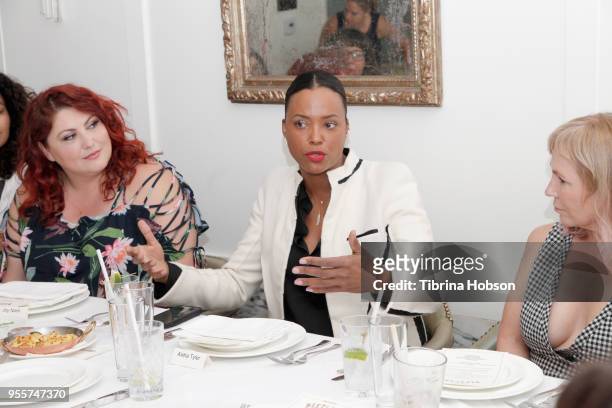 Joy Nash, Aisha Tyler and Marti Noxon attend an intimate luncheon hosted by AMC in Celebration of Their New Original Series, 'Dietland' on May 7,...