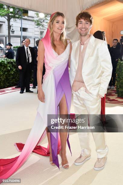 Doutzen Kroes and designer Sies Marjan attend the Heavenly Bodies: Fashion & The Catholic Imagination Costume Institute Gala at The Metropolitan...