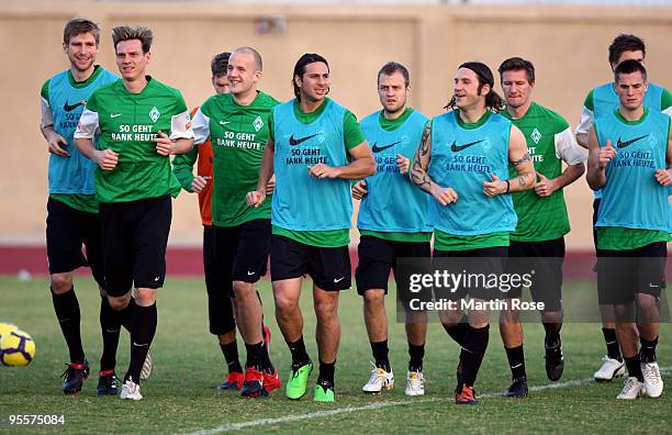 Players of Bremen run during the Werder Bremen training session at the Al Wasl training ground on January 4, 2010 in Dubai, United Arab Emirates.