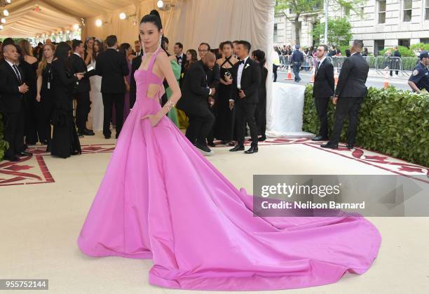 Ming Xi attends the Heavenly Bodies: Fashion & The Catholic Imagination Costume Institute Gala at The Metropolitan Museum of Art on May 7, 2018 in...