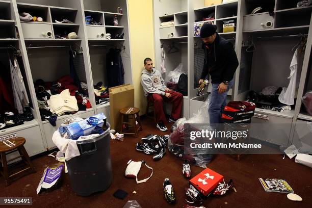 Washington Redskins kicker Graham Gano and punter Hunter Smith clean out their lockers before a press conference by Redskins General Manager Bruce...