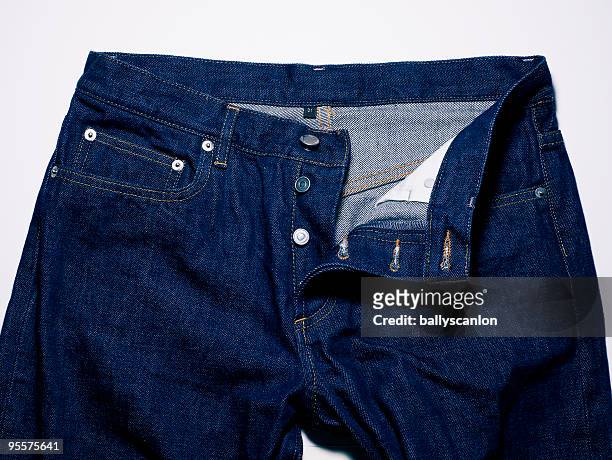 denim jeans with open button fly. - öppna och stäng knapp bildbanksfoton och bilder
