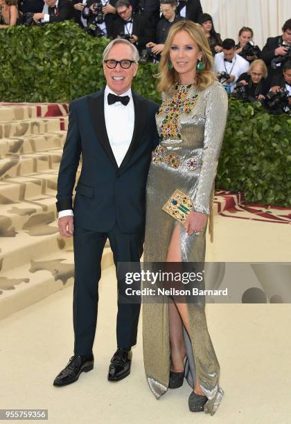 Tommy Hilfiger and Dee Hilfiger attend the Heavenly Bodies: Fashion & The Catholic Imagination Costume Institute Gala at The Metropolitan Museum of...