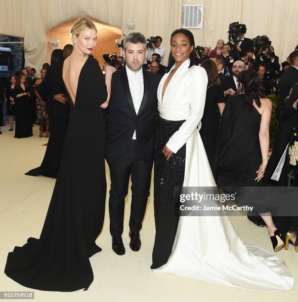 Karli Kloss, Brandon Maxwell and Tiffany Haddish attend the Heavenly Bodies: Fashion & The Catholic Imagination Costume Institute Gala at The...