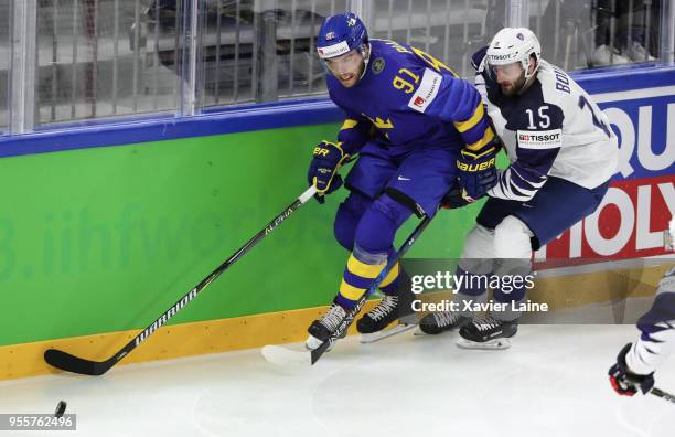 Magnus Paajarvi of Sweden in action with Maurin Bouvet of France during the 2018 IIHF Ice Hockey World Championship Group A between Sweden and France...