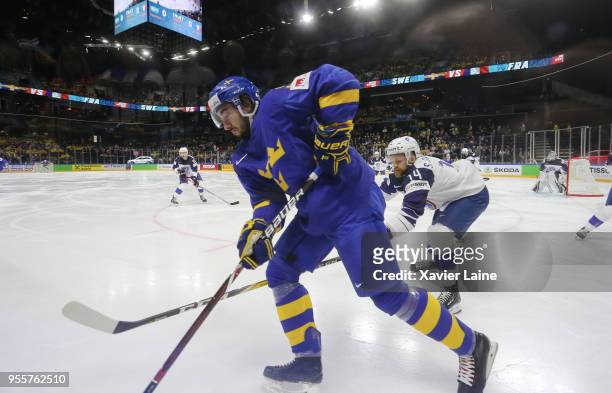Mika Zibanejad of Sweden in action with Stephane Da Costa of France during the 2018 IIHF Ice Hockey World Championship Group A between Sweden and...