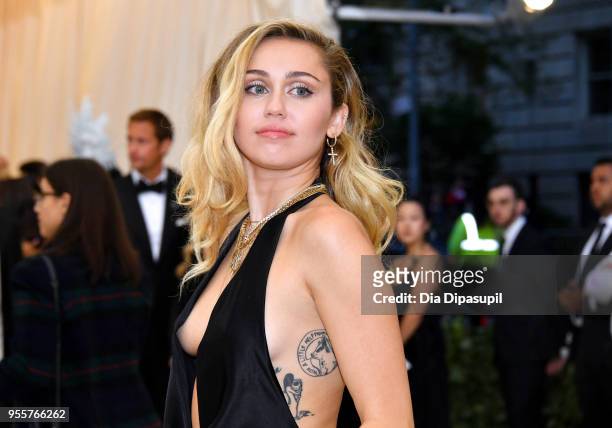 Miley Cyrus attends the Heavenly Bodies: Fashion & The Catholic Imagination Costume Institute Gala at The Metropolitan Museum of Art on May 7, 2018...