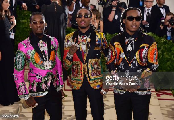 Offset, Quavo and Takeoff of the group Migos attend the Heavenly Bodies: Fashion & The Catholic Imagination Costume Institute Gala at The...