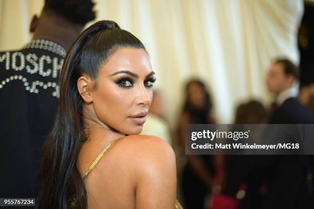 Kim Kardashian West attends the Heavenly Bodies: Fashion & The Catholic Imagination Costume Institute Gala at The Metropolitan Museum of Art on May...