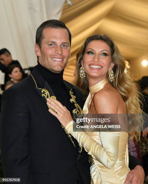 Tom Brady and Gisele Bundchen arrive for the 2018 Met Gala on May 7 at the Metropolitan Museum of Art in New York. / The erroneous mention[s]...