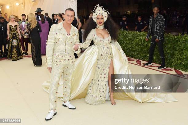 Designer Jeremy Scott and Cardi B attend the Heavenly Bodies: Fashion & The Catholic Imagination Costume Institute Gala at The Metropolitan Museum of...