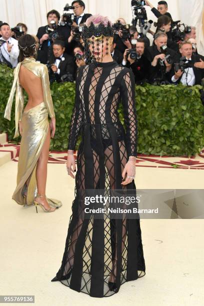 Cara Delevingne attends the Heavenly Bodies: Fashion & The Catholic Imagination Costume Institute Gala at The Metropolitan Museum of Art on May 7,...