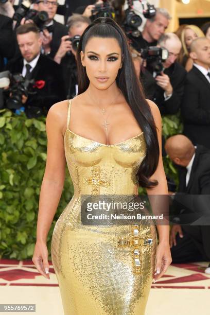 Kim Kardashian attends the Heavenly Bodies: Fashion & The Catholic Imagination Costume Institute Gala at The Metropolitan Museum of Art on May 7,...