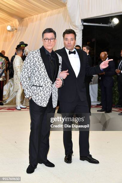 Stephen Colbert and Jimmy Fallon attend the Heavenly Bodies: Fashion & The Catholic Imagination Costume Institute Gala at The Metropolitan Museum of...