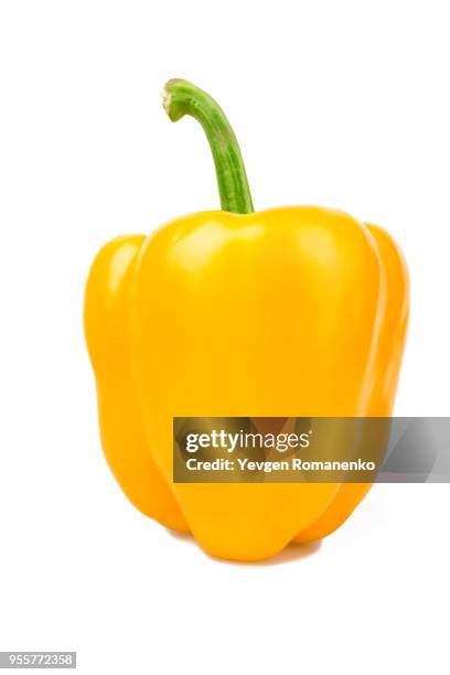 yellow bell pepper isolated on white background - gele paprika stockfoto's en -beelden