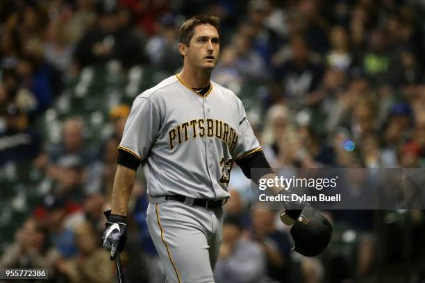 David Freese of the Pittsburgh Pirates walks back to the dugout after striking out in the seventh inning against the Milwaukee Brewers at the Miller...