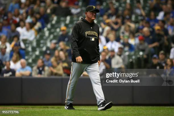 Manager Clint Hurdle of the Pittsburgh Pirates walks back to the dugout in the ninth inning against the Milwaukee Brewers at the Miller Park on May...