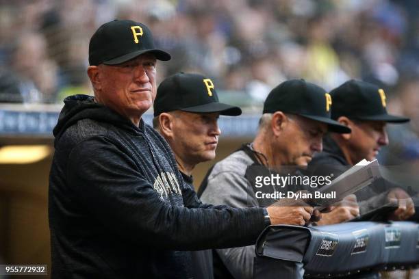Manager Clint Hurdle of the Pittsburgh Pirates looks on from the dugout in the fourth inning against the Milwaukee Brewers at the Miller Park on May...
