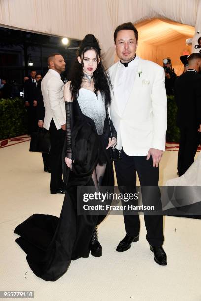 Grimes and Elon Musk attend the Heavenly Bodies: Fashion & The Catholic Imagination Costume Institute Gala at The Metropolitan Museum of Art on May...