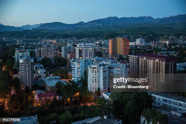 Residential and commercial buildings stand in Dushanbe, Tajikistan, on Saturday, April 21, 2018. Flung into independence after the Soviet Union...