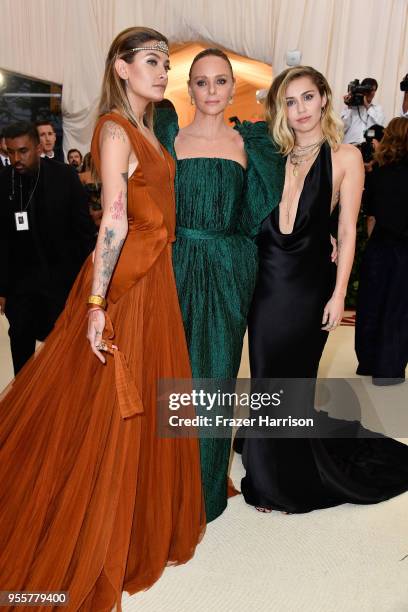 Paris Jackson, Stella McCartney and Miley Cyrus attend the Heavenly Bodies: Fashion & The Catholic Imagination Costume Institute Gala at The...