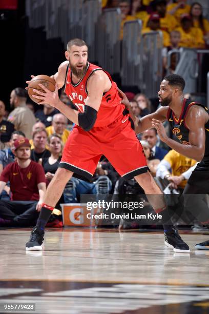 Jonas Valanciunas of the Toronto Raptors handles the ball against the Cleveland Cavaliers in Game Four of the Eastern Conference Semifinals during...