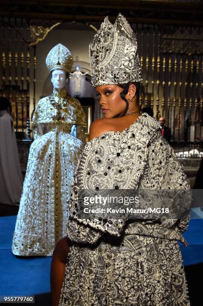 Met Gala Host, Rihanna attends the Heavenly Bodies: Fashion & The Catholic Imagination Costume Institute Gala at The Metropolitan Museum of Art on...