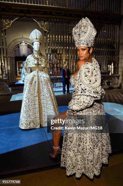 Met Gala Host, Rihanna attends the Heavenly Bodies: Fashion & The Catholic Imagination Costume Institute Gala at The Metropolitan Museum of Art on...