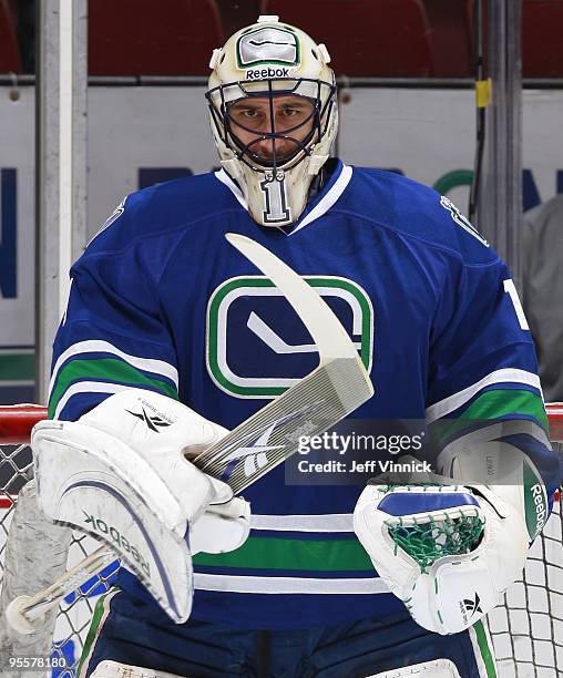 Roberto Luongo of the Vancouver Canucks looks on from his crease during their game against the Anaheim Ducks at General Motors Place on December 16,...