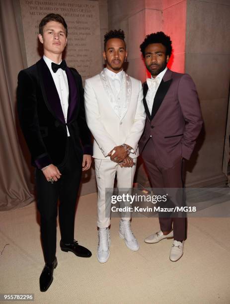 Ansel Elgort, Lewis Hamilton, and Donald Glover attend the Heavenly Bodies: Fashion & The Catholic Imagination Costume Institute Gala at The...