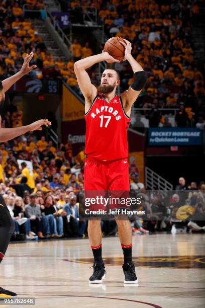 Jonas Valanciunas of the Toronto Raptors looks to pass against the Cleveland Cavaliers during Game Four of the Eastern Conference Semifinals of the...