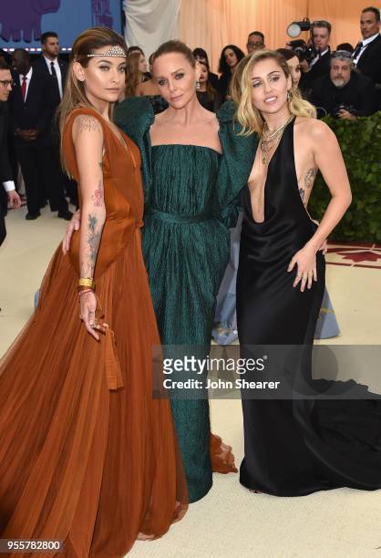 Paris Jackson, Stella McCartney, and Miley Cyrus attend the Heavenly Bodies: Fashion & The Catholic Imagination Costume Institute Gala at The...